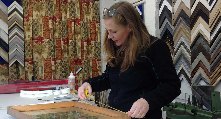 Barbara measuring a frame