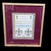 Framed picture of a tappestry pattern